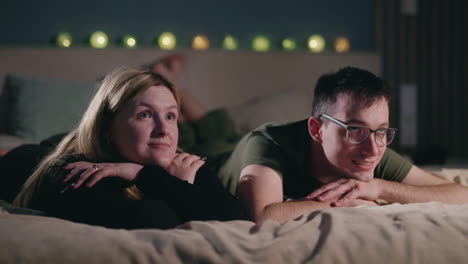 couple relaxing in bed