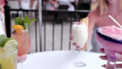 Group-Of-Friends-Toasting-Tropical-Drinks