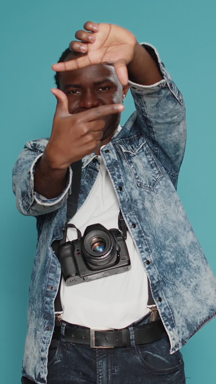 Photographer Making Frame With Hands