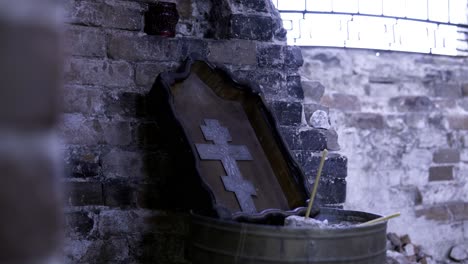 religious cross in an old brick church