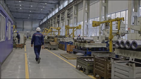 factory production line with robots and workers