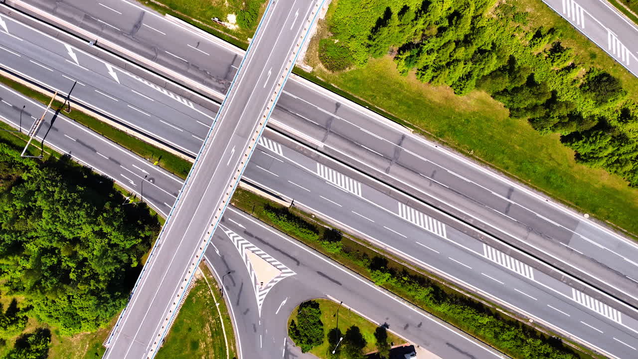 Flight over the highways and freeway with some cars on. Drone footage above the roads in Slovakia