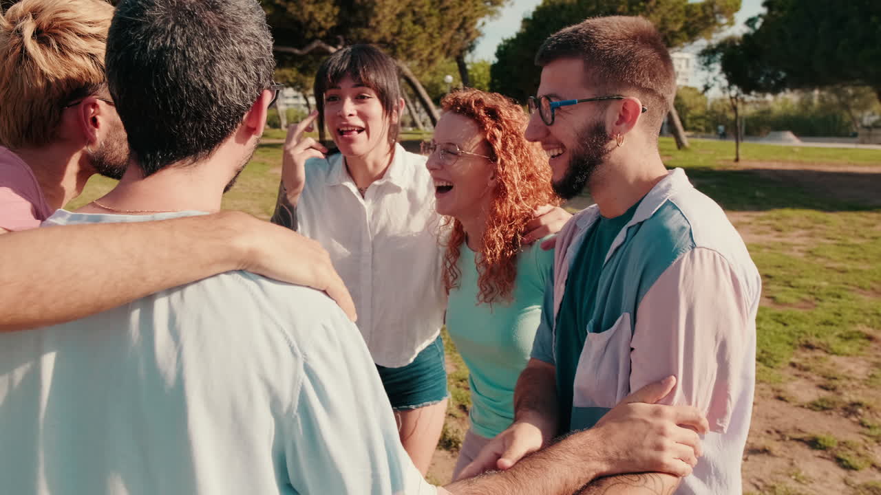 Friends Hugging and Laughing in the Park