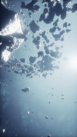 colossal field of menacing space debris amidst a cosmic fog vertical