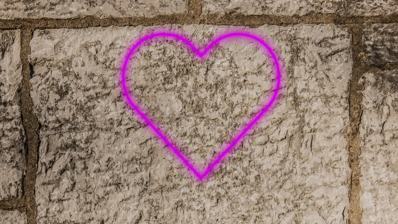 signo de corazón de neón en la pared de ladrillo 4k