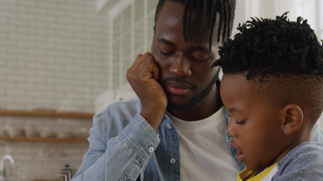 Father and son at home