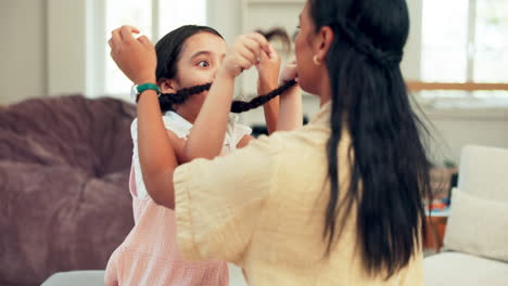 care, love and mother doing child hairstyle