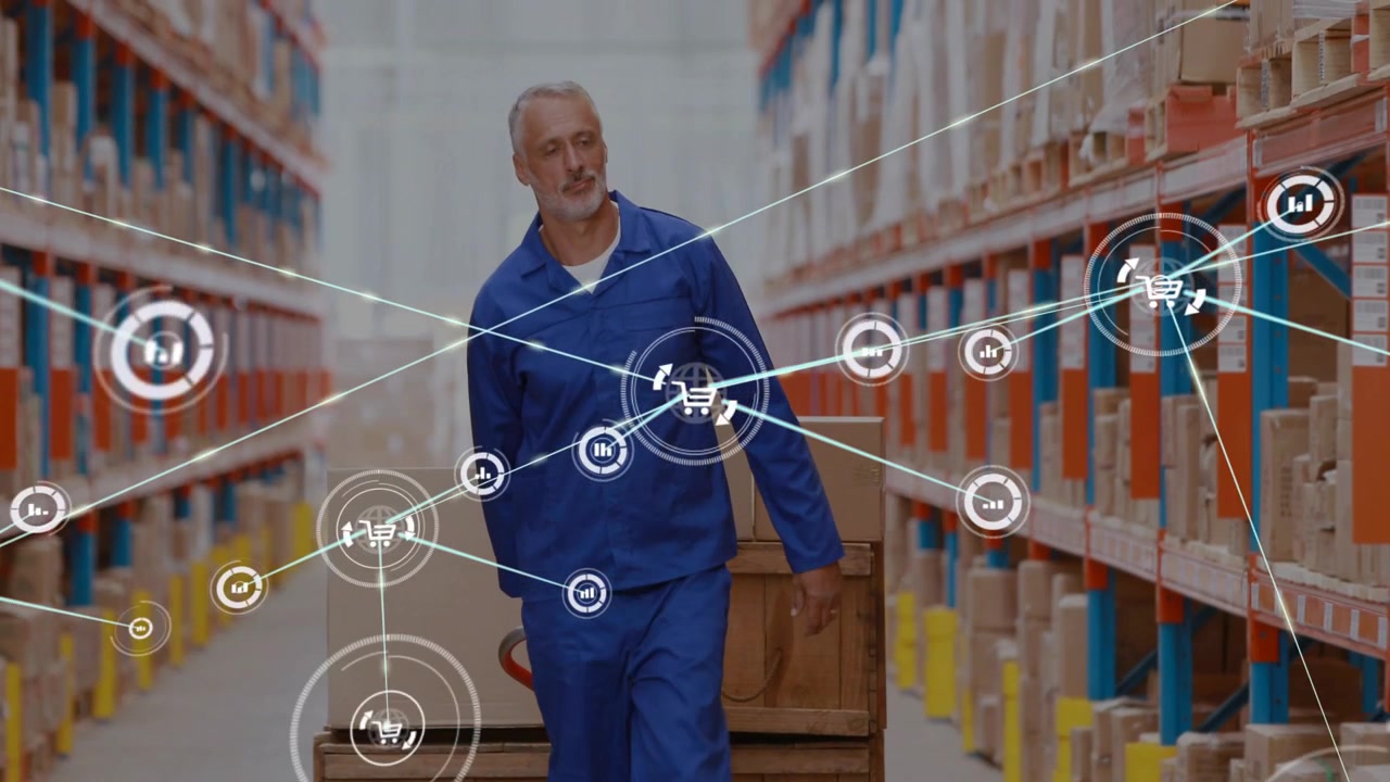 Senior picker starting pushing pallet jack down aisle while inventory UI expanding for tracking