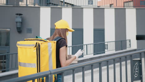 food delivery person outside in the city