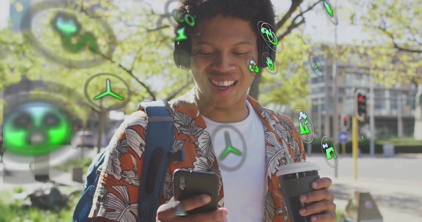 Young Man with Headphones Interacting with Augmented Reality Environmental Icons