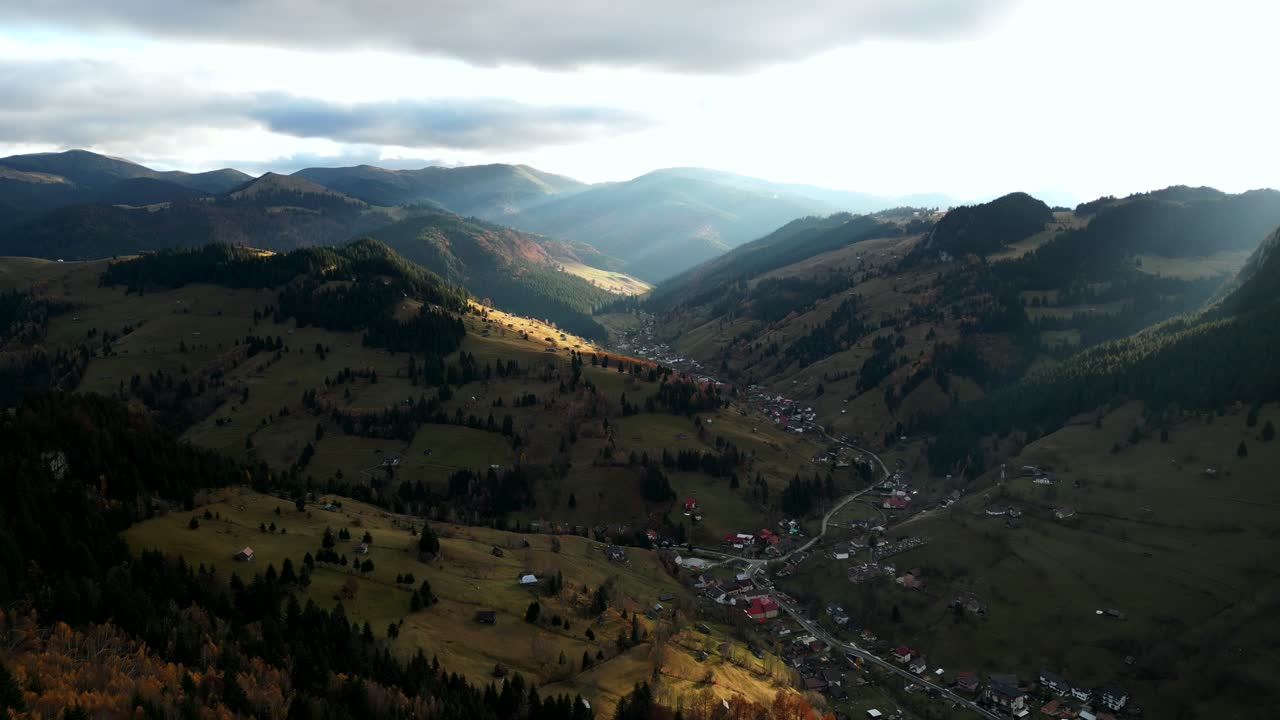 Mountain Village Of Moieciu de Sus In Brasov County, Romania. Aerial Drone Shot