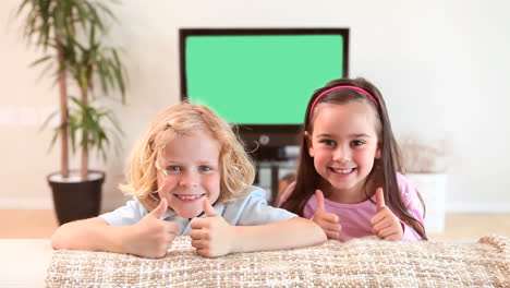 children sitting on a couch