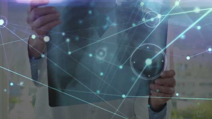 Animation of network of connections over hands of caucasian male doctor with x ray photo
