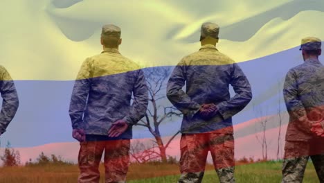 animación de la bandera de colombia sobre varios soldados varones