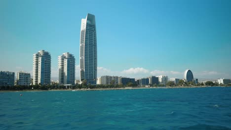 panoramic view of limassol's skyline from a moving boat