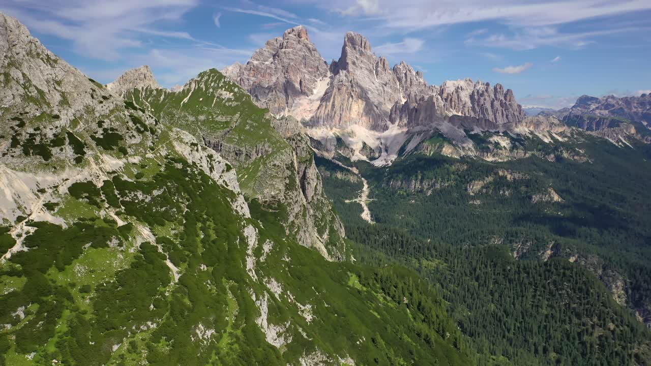 Cristallo mountain and landscape in the Dolomites, panoramic forward aerial