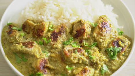 afghani chicken in green curry or hariyali tikka chicken hara masala with rice - asian food style