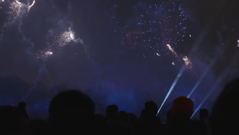 capturing fireworks celebration against a dark night background