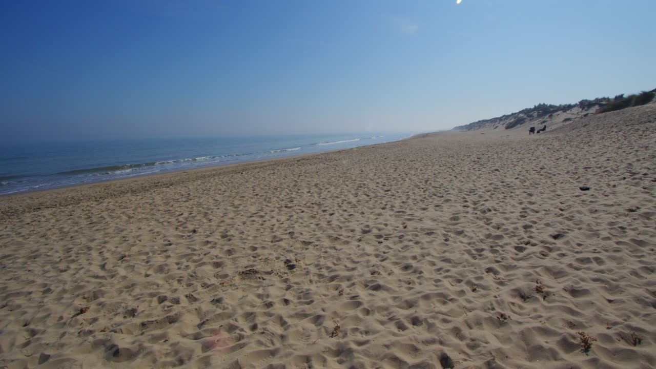 low level shot looking South down Horsey beach to Winterton on Sea,