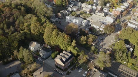 Houses-in-the-mountain-range-rural-over-the-Hudson-River-aerial-4k-during-sunset