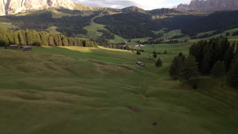 Small-settlement-in-mountainous-valley-covered-with-lush-forest