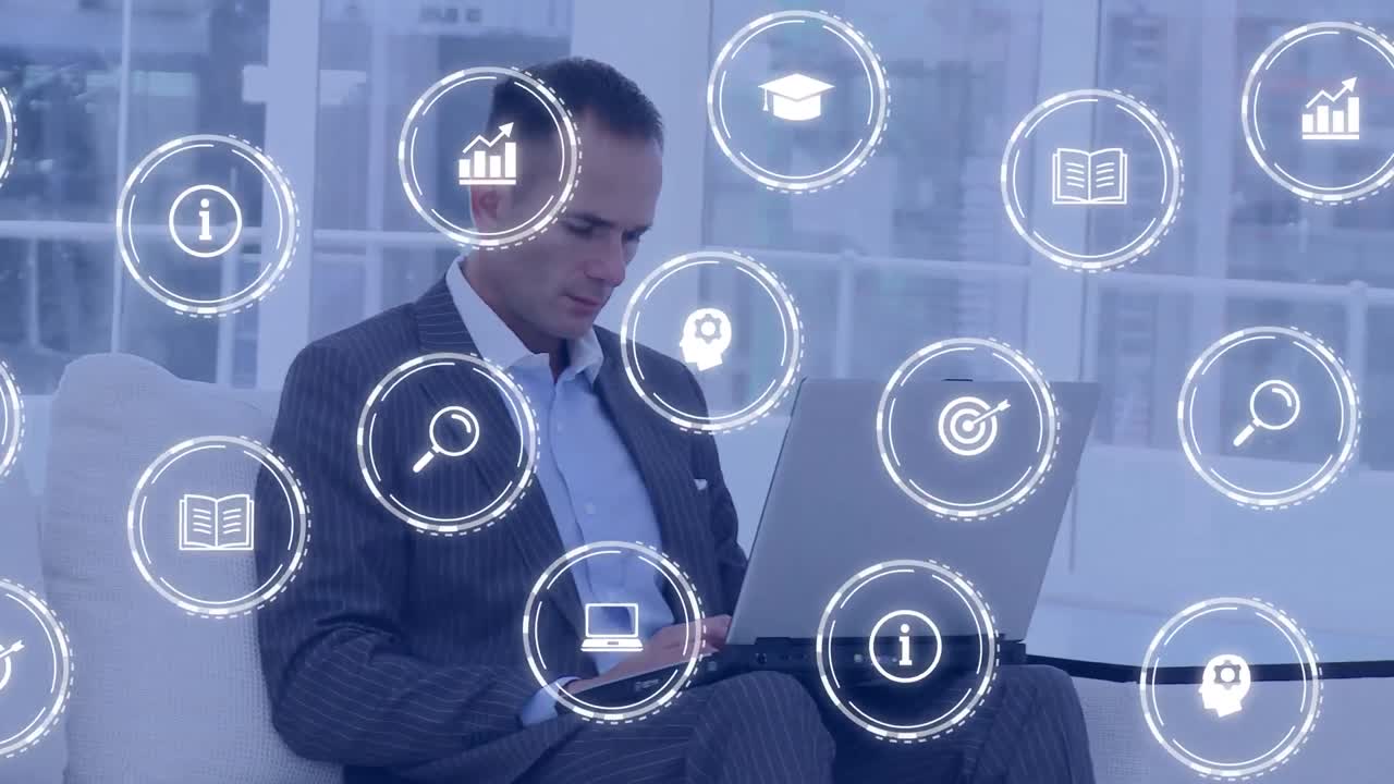 Animation of falling education icons over caucasian men using laptop