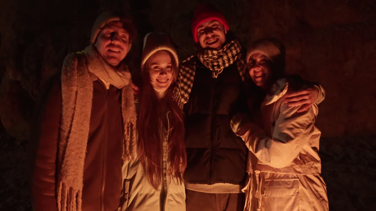 Friends by the Campfire in a Cave