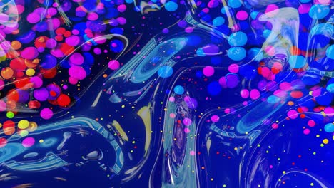 abstract looped background of shiny glossy surface like wavy blue liquid with rainbow color circles float like drops of paint in oil. Beautiful creative background with color gradient in 4k. 3d