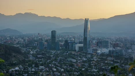 santiago, chile financial district with andes mountain range in background, dawn time lapse