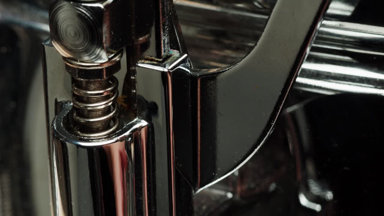 Close-up view of a machine's metal components