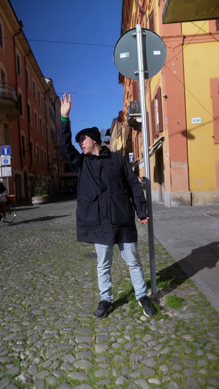 Man Posing in a City Street