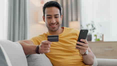 man, credit card and phone for home online