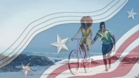 multiple stars on blue stripes against african american couple riding bicycle at the beach