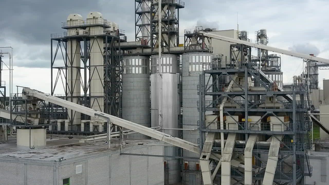 Factory with smoking pipes aerial view