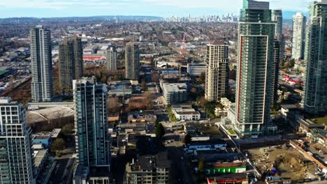 high-rise buildings in burnaby with downtown vancouver in the background in canada