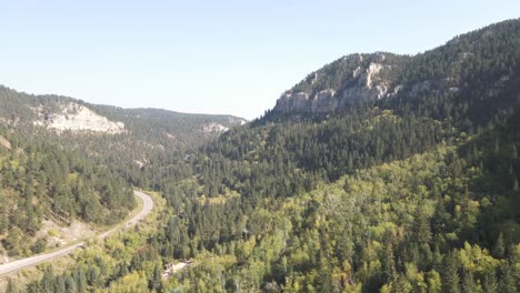 Drone-flying-over-fall-colored-leaves-in-Spearfish-Canyon