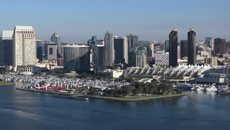 coronado bay and the downtown san diego city skyline as seen from the ocean - sliding aerial