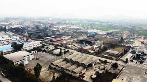 a typical industrial area in pakistan as workers go about their business