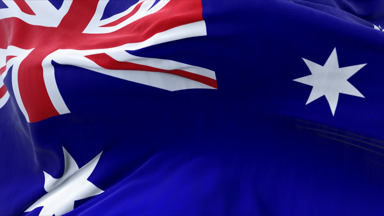 Detail of the national flag of Australia flying in the wind.