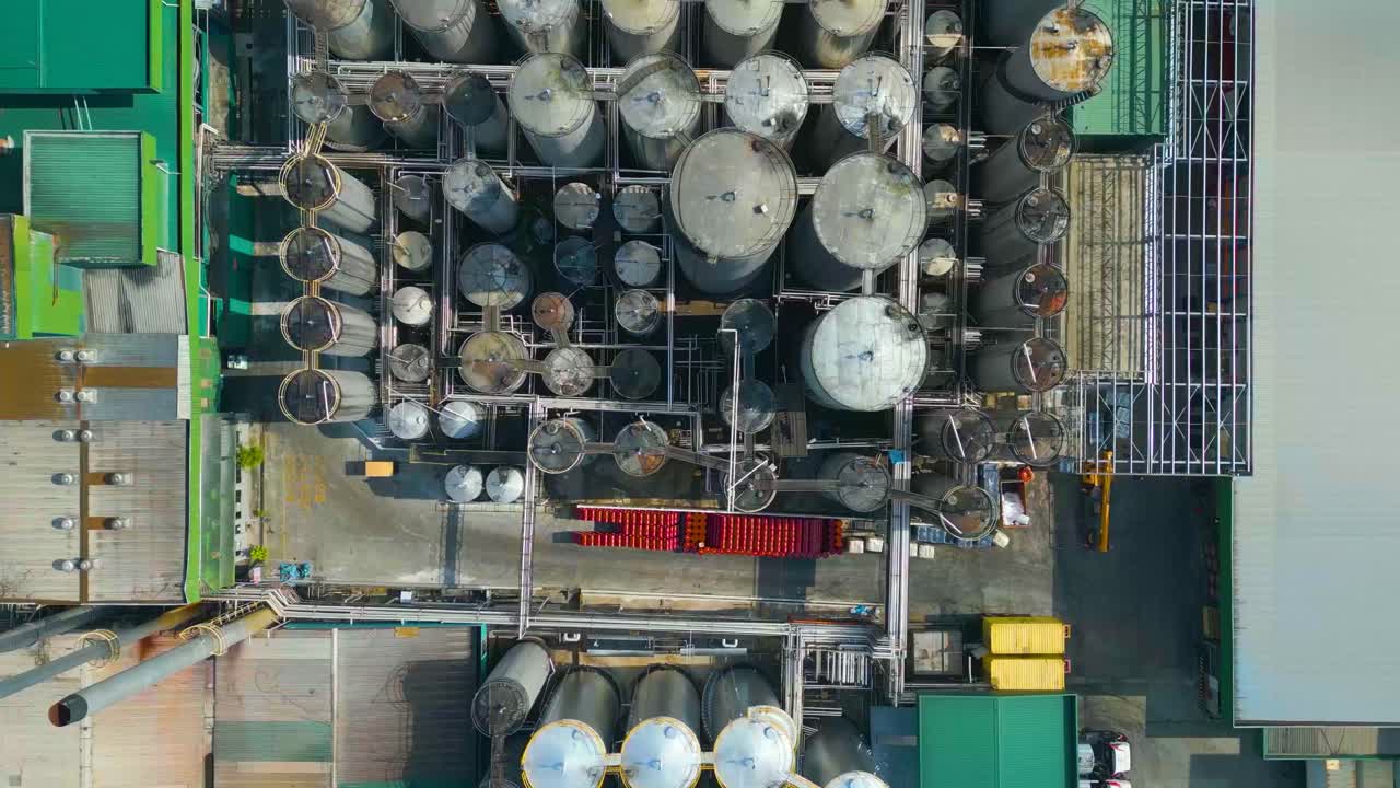 Aerial view of palm kernel oil tanks in oil refinery plant , Malaysia
