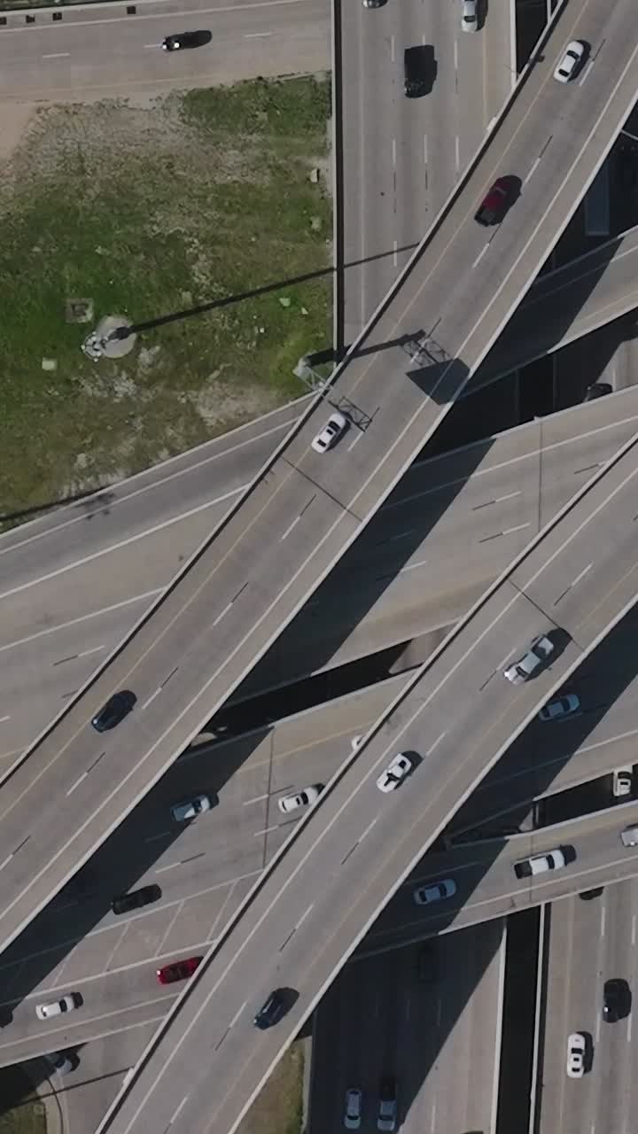 Dallas downtown aerial view showing highways and traffic flow at midday