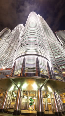 kuala lumpur petronas towers and skyline in vertical