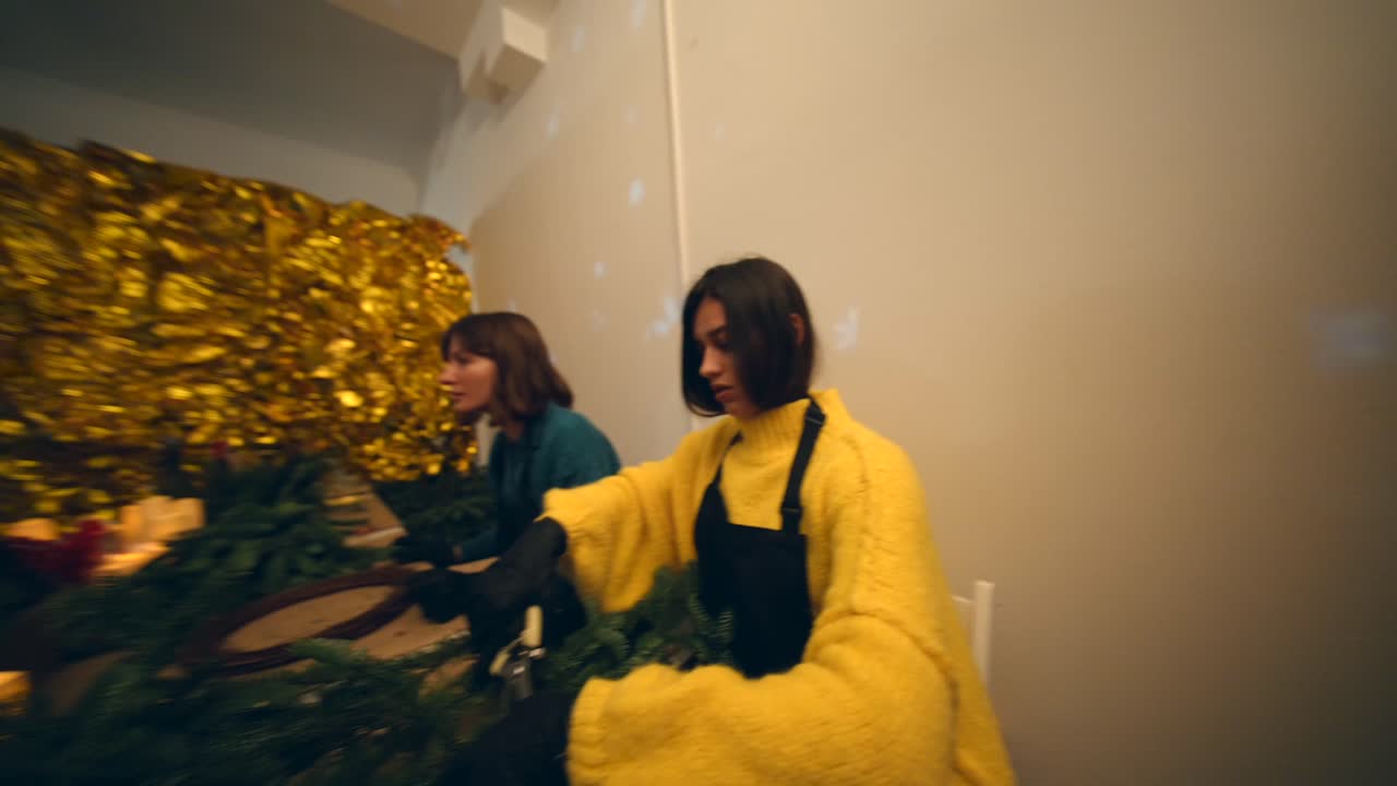 People making Christmas decorations