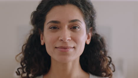 portait beautiful mixed race woman smiling looking up at camera with happy emotion enjoying successful lifestyle