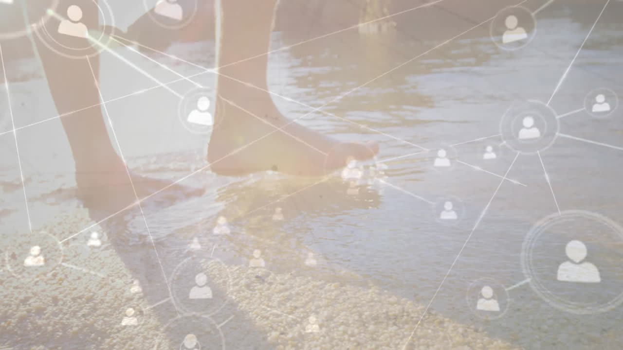 Tech-Netzwerk-Symbole verblassen zu Füßen, während ein Mann sich bewegt und ins Wasser tritt, um Nutzer zu verbinden