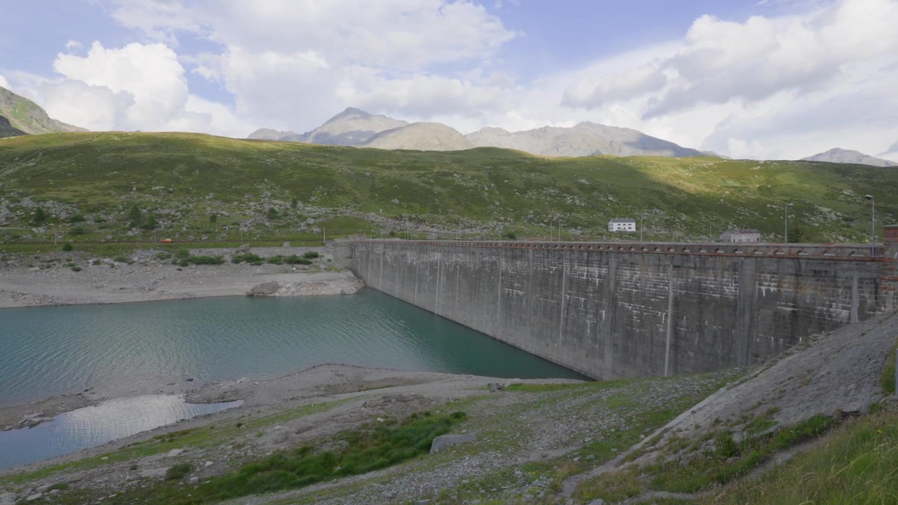 Montespluga Dam and the surrounding Lago di Montespluga reservoir in the Lombardy region of Italy