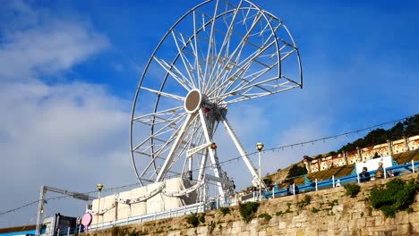 Llandudno-pier-Ferris-wheel-turning-for-dismantling-at-end-of-tourism-season-2021