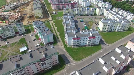 new modern quarter with high-rise buildings on the background of the urban view. aerial view