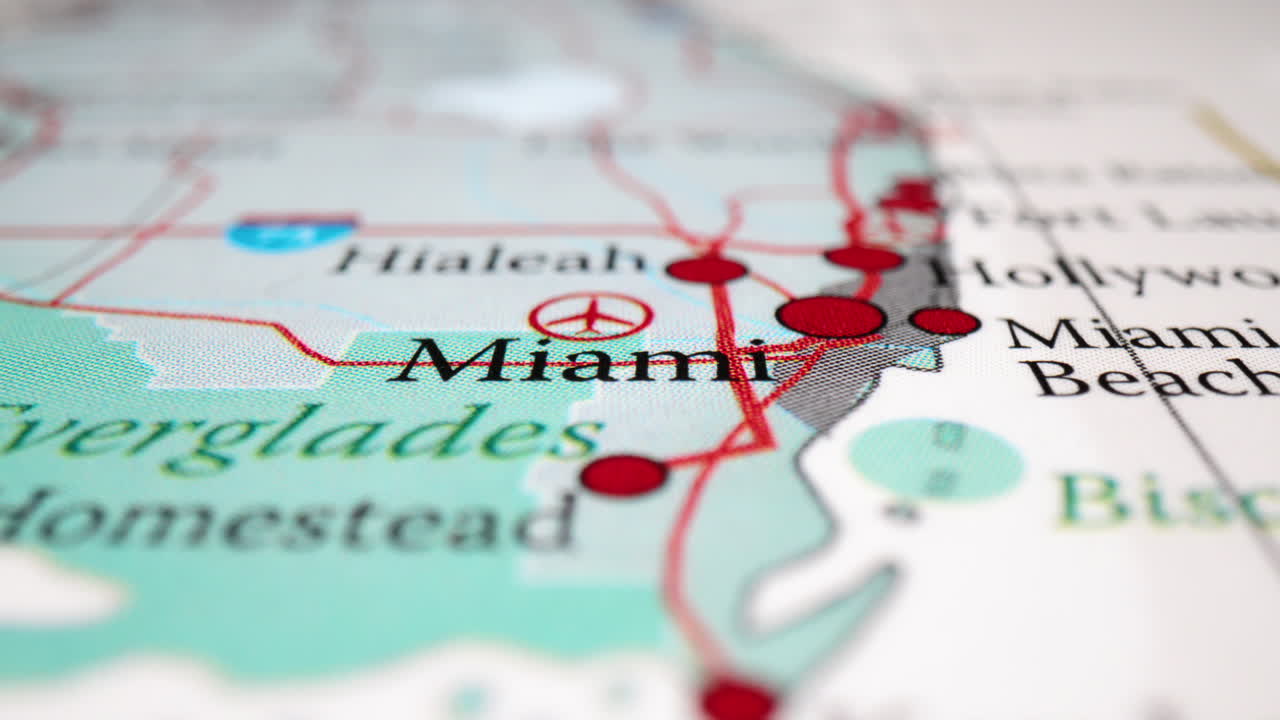 Miami City In Florida With Flight Route and Red Dots In The Map Of USA. - rack focus zoom in shot