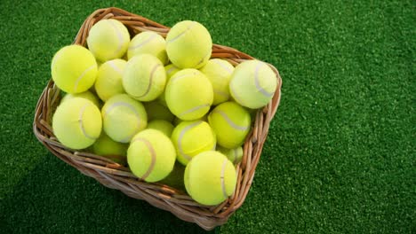 tennis balls in wicker basket at studio 4k